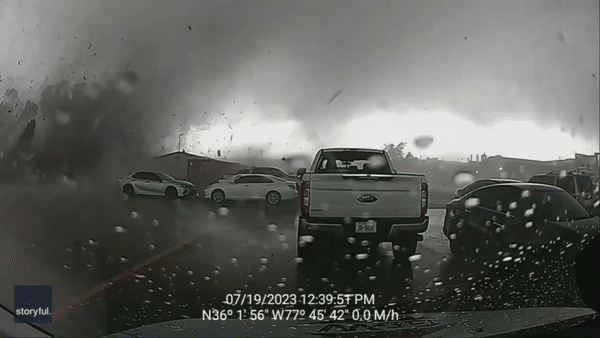 Dramatic video shows tornado tearing through parking lot of North Carolina Pfizer facility