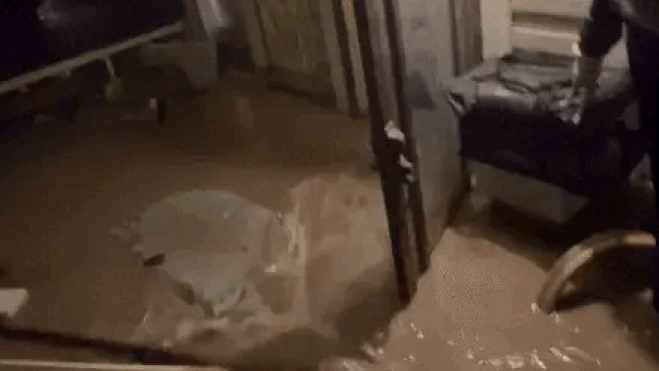 VIDEO: New Mexico couple, pets wait for rescue on flooded Roswell porch Saturday