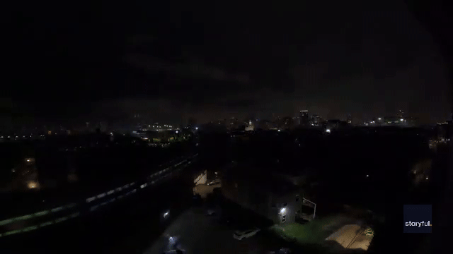 Triple lightning strike illuminates skies over Chicago as severe thunderstorms trigger flash flooding