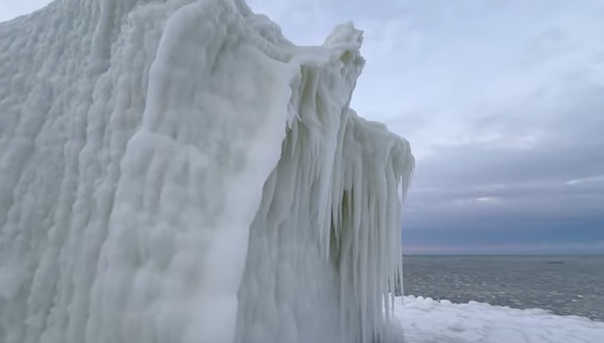 Eerie sight: Bitter cold transforms Michigan lighthouse into 'ice monster'