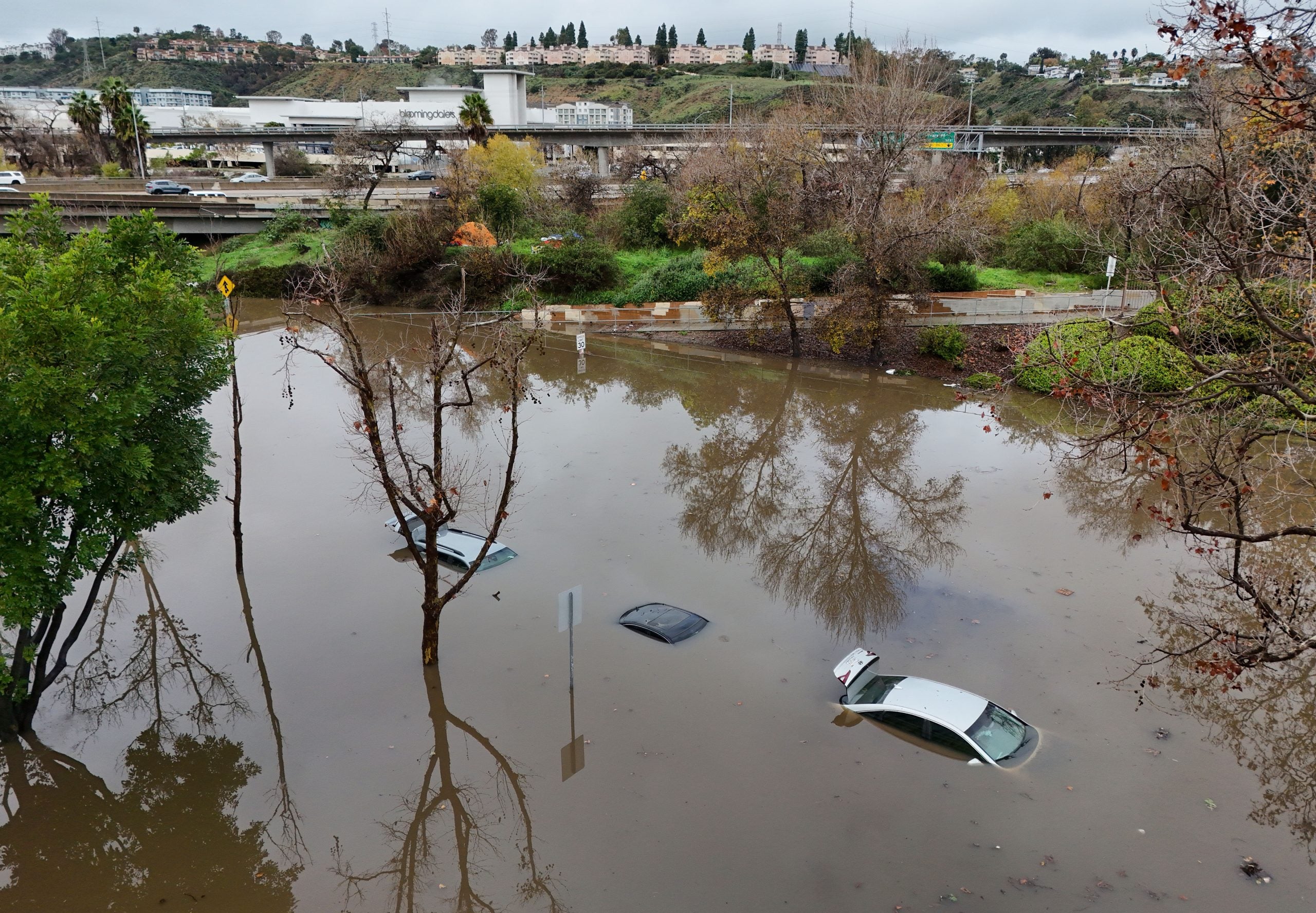 Man dies in California after being swept away into creek during flooding, torrential rain