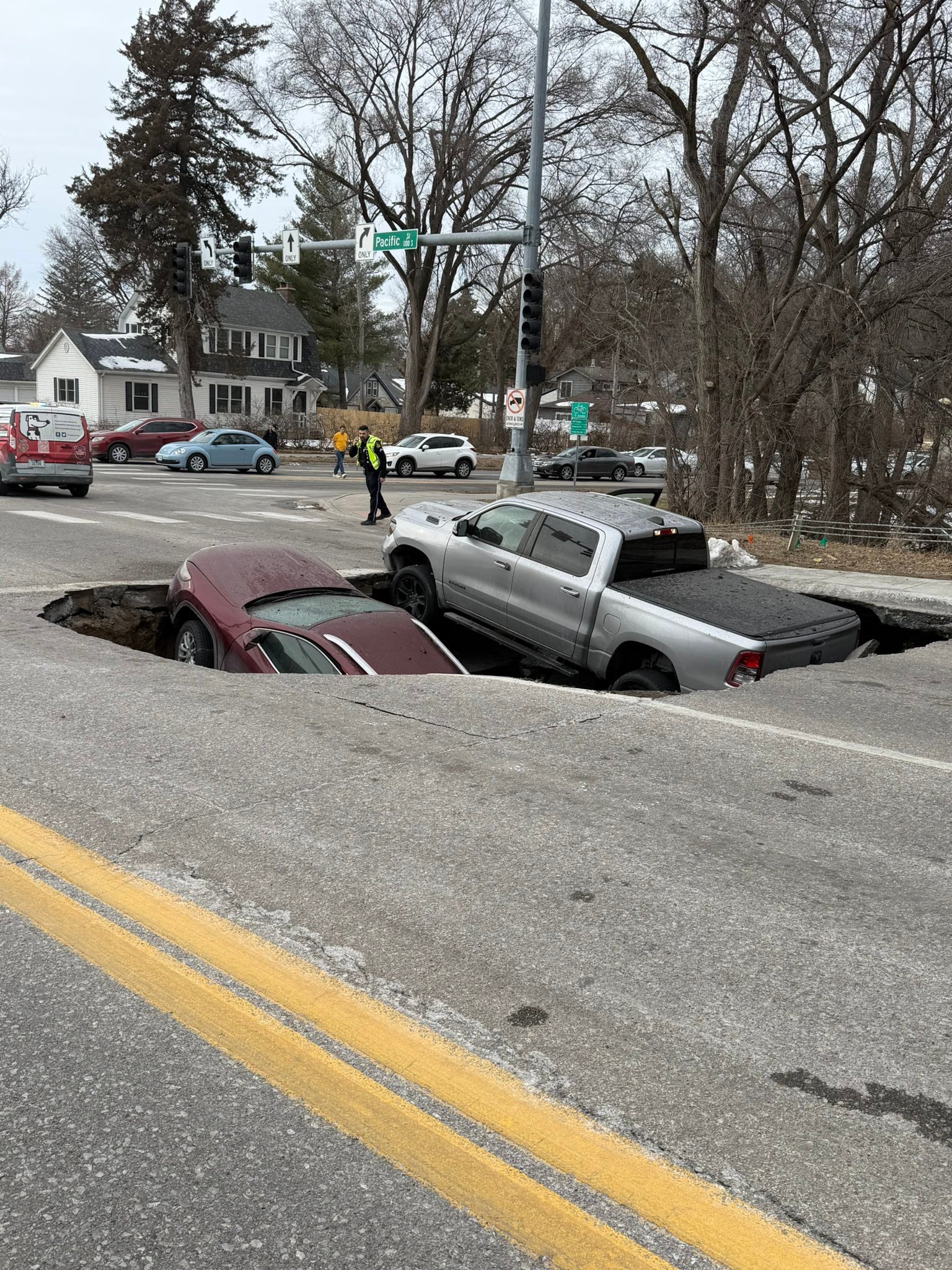 Video: Large sinkhole swallows two vehicles in Nebraska