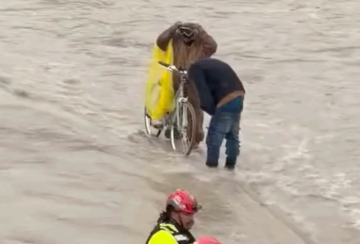 Watch: Firefighters rescue two men caught in rising Texas creek waters amid severe weather across the South