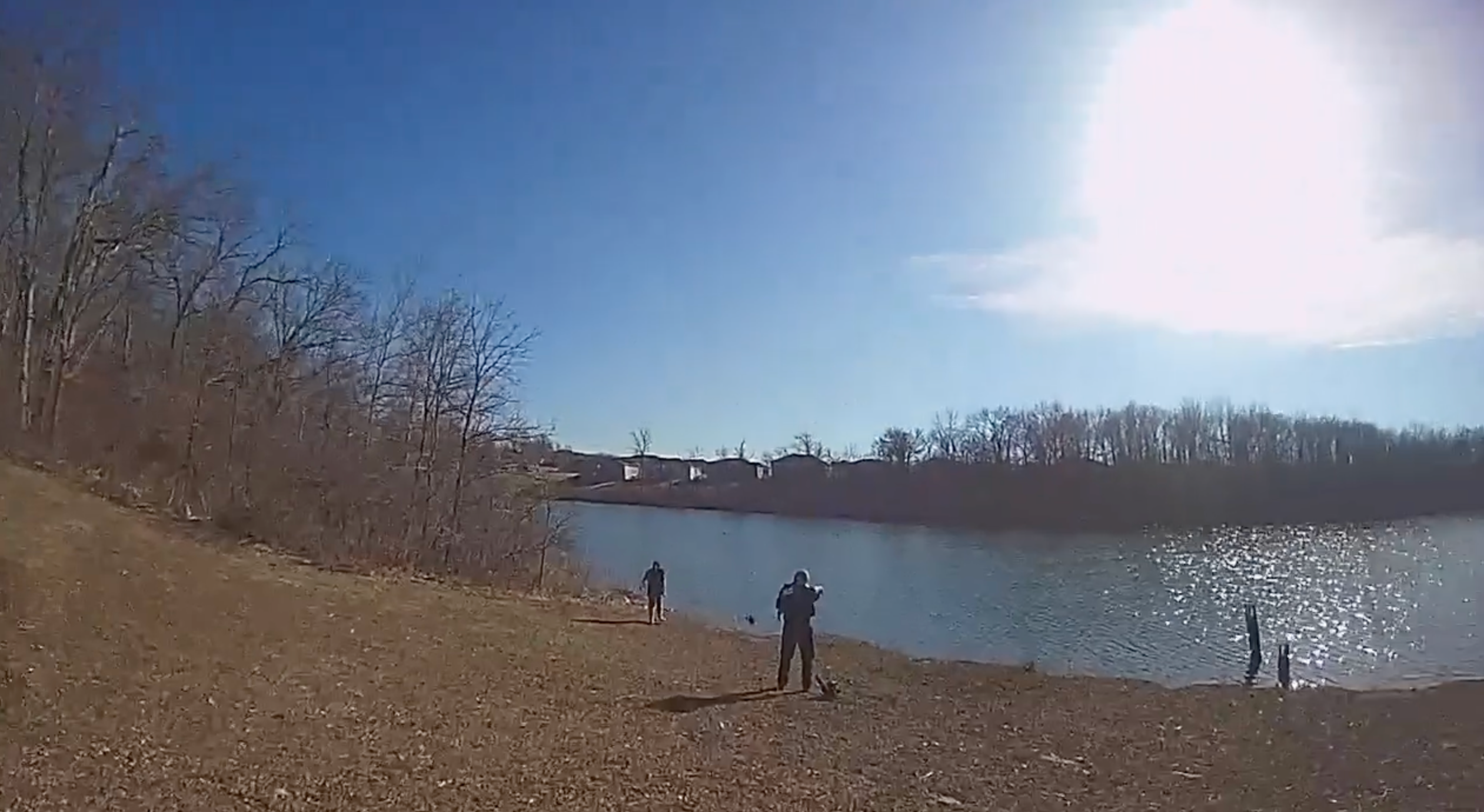 Watch: Heroic police officers spring into action to save woman in dramatic lake rescue