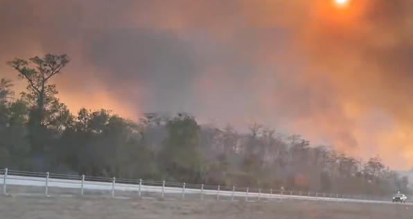 Florida wildfire explodes to 25,000 acres, with some relief on the way for historic drought