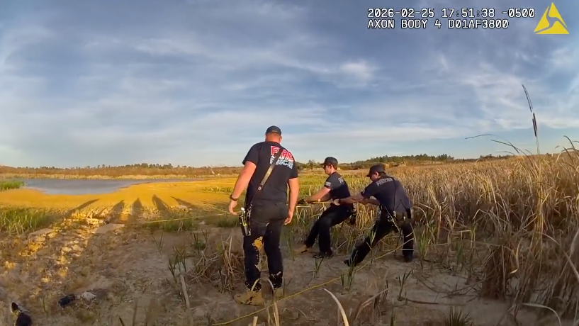Video: Missing man rescued after being buried to his shoulders in quick sand in Florida