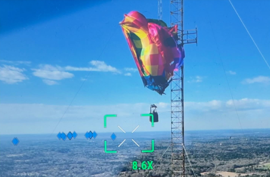 Video: Two rescued after hot air balloon crashes into 920-foot cell tower in Texas