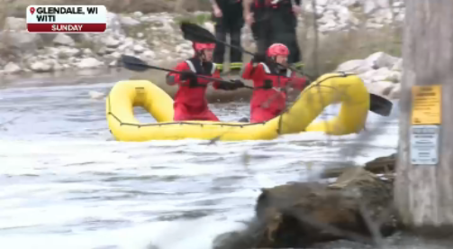 Video: Father and son rescued after capsizing in rough waters while kayaking in Milwaukee River
