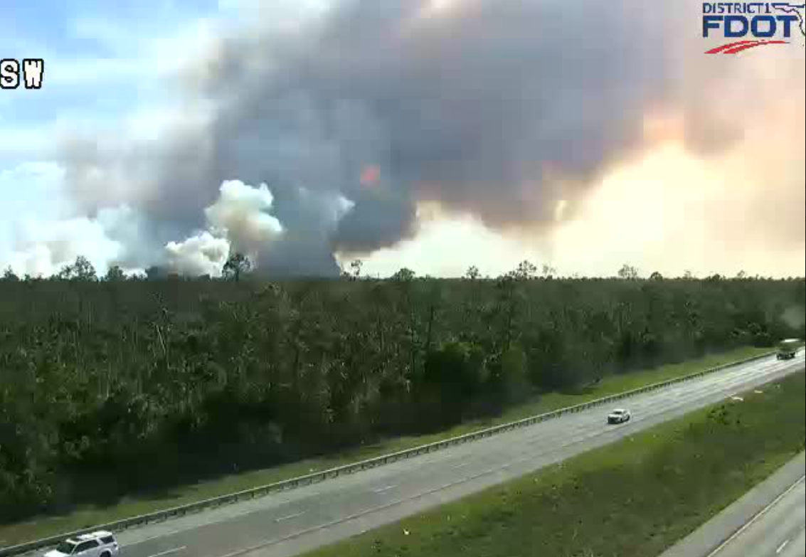Residents being evacuated as brush fire rapidly spreads near major Florida interstate