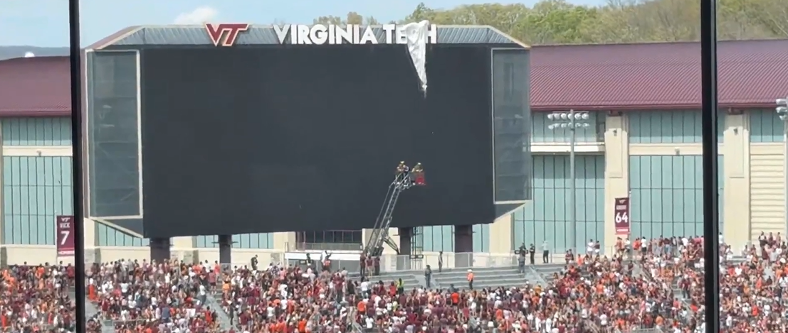 Watch: Parachuter crashes into scoreboard before Virginia Tech spring football game