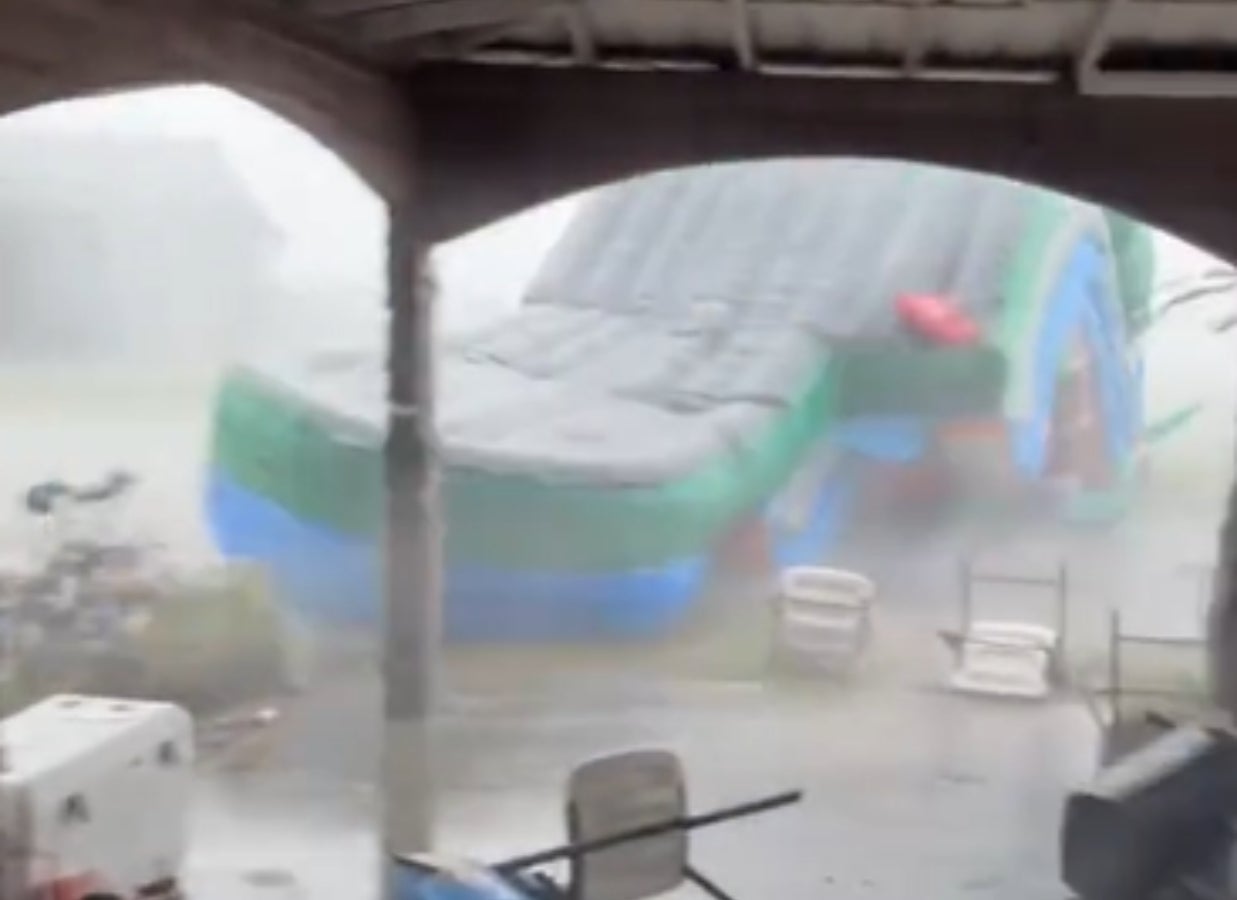 Look out: Powerful winds send bounce house tumbling through yard and into SUV in Florida