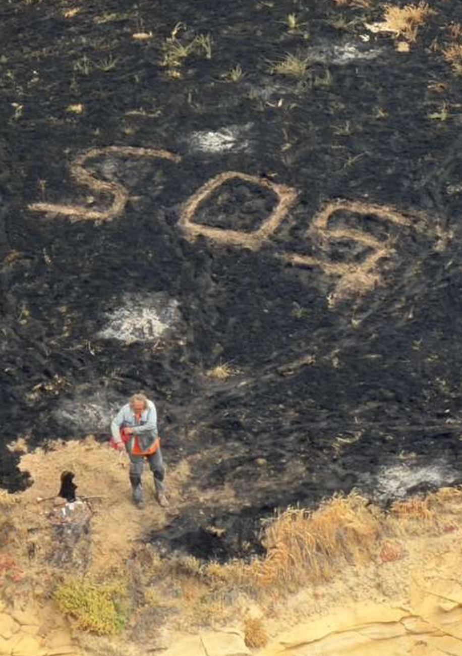 Sailor rescued in the knick of time as massive, record-breaking wildfire engulfs California island