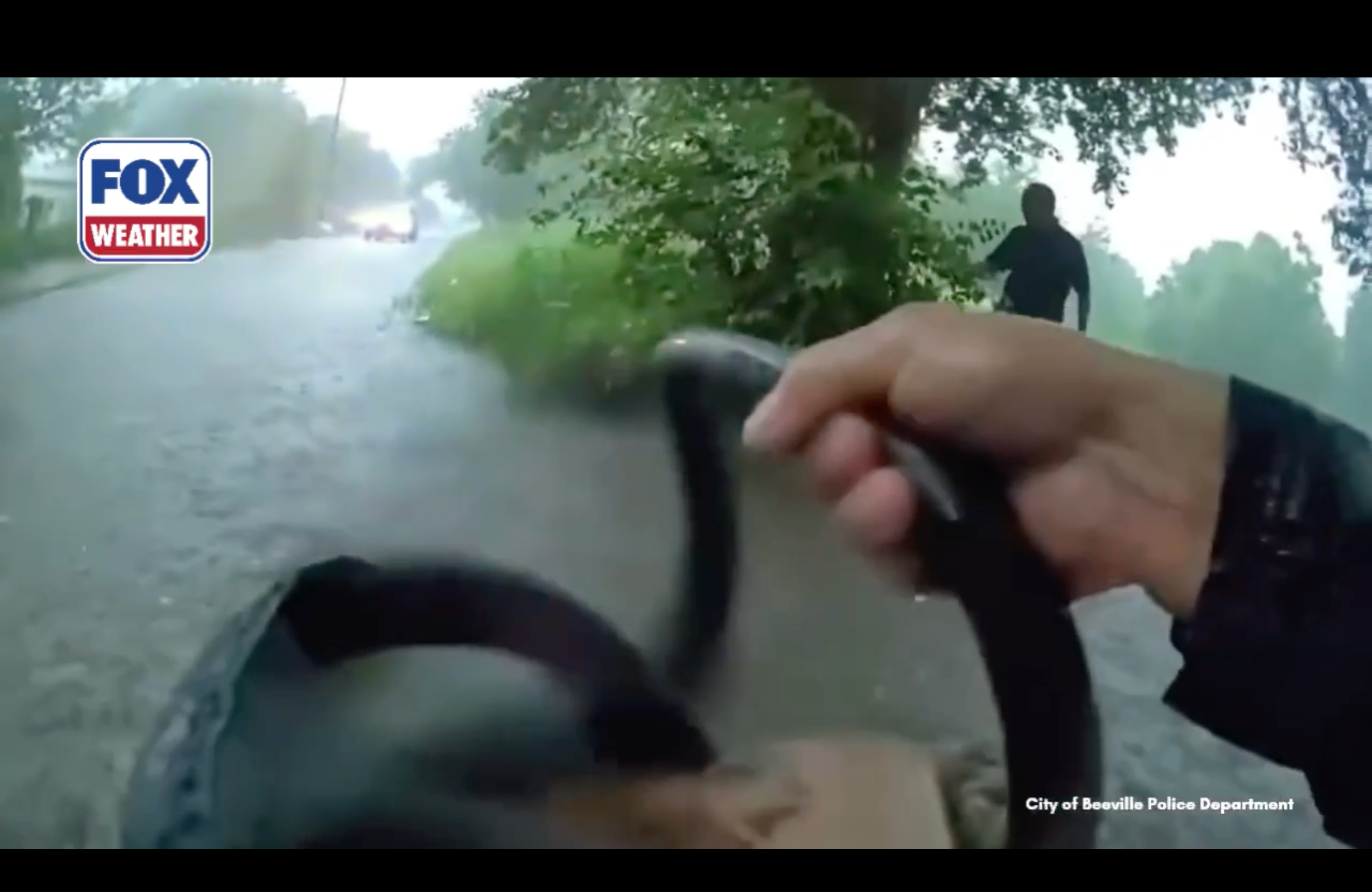Watch: First responders rescue infant after car is trapped in rushing Texas floodwater