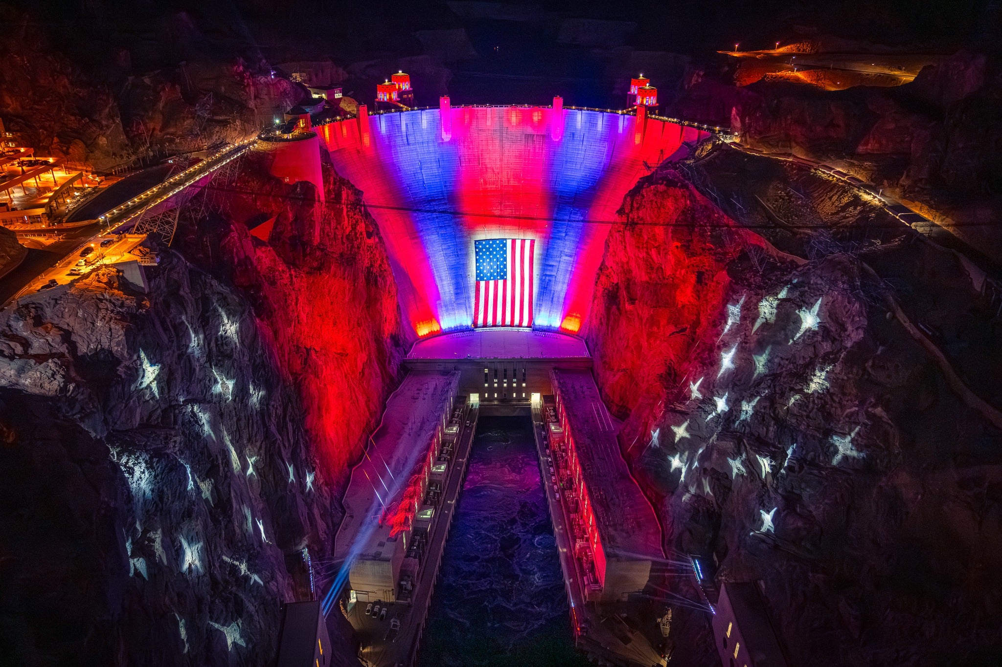 Giant American flag draped over Hoover Dam lowered until further notice due to gusty winds