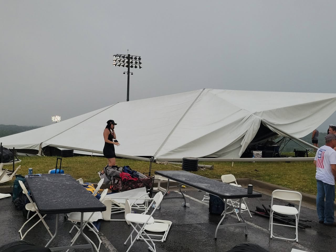 Five injured after ferocious winds and severe storms rip through college baseball game, sending tents airborne