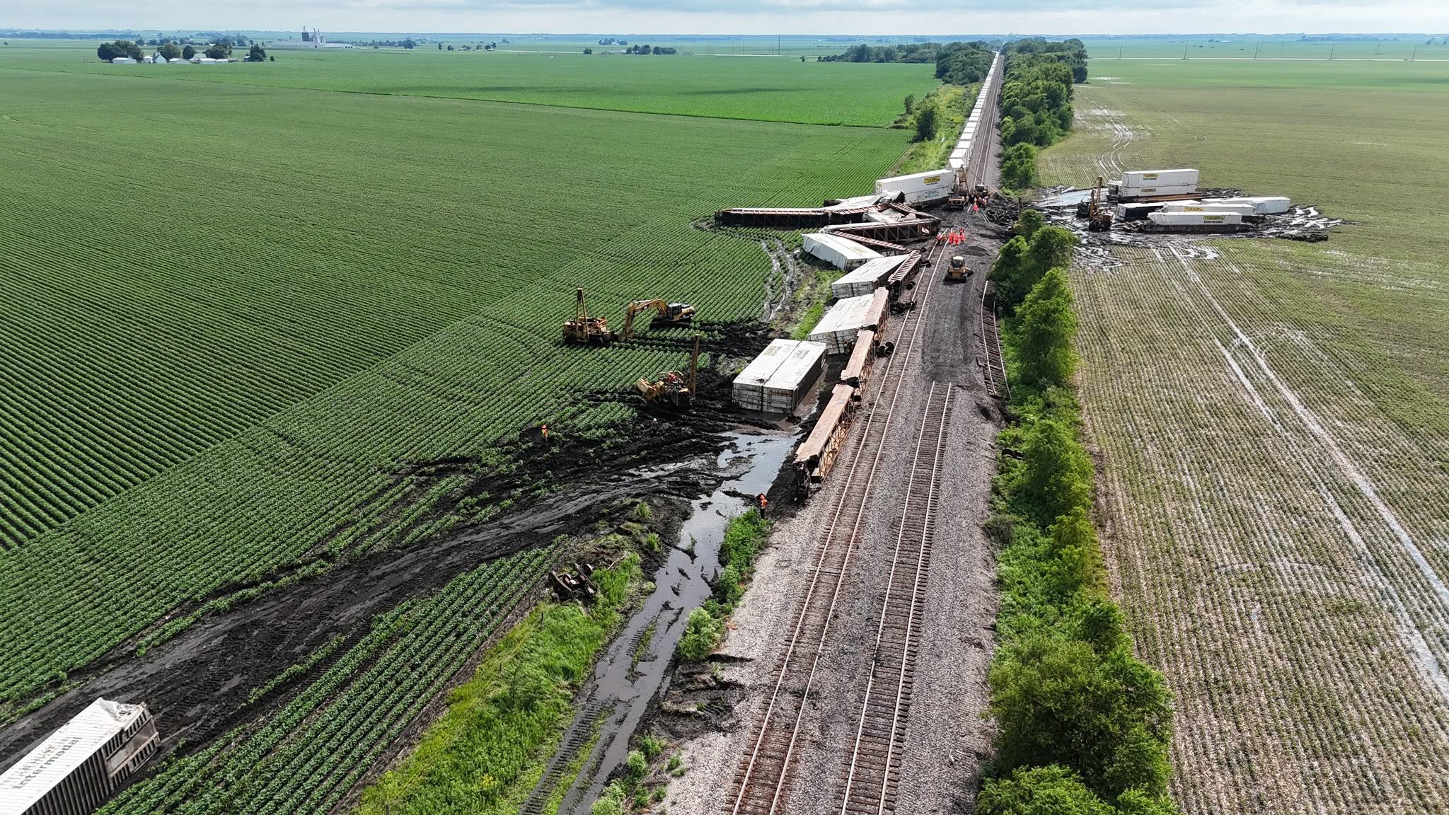 Drone video captures double-stack train cars toppled over after destructive winds tore through Illinois