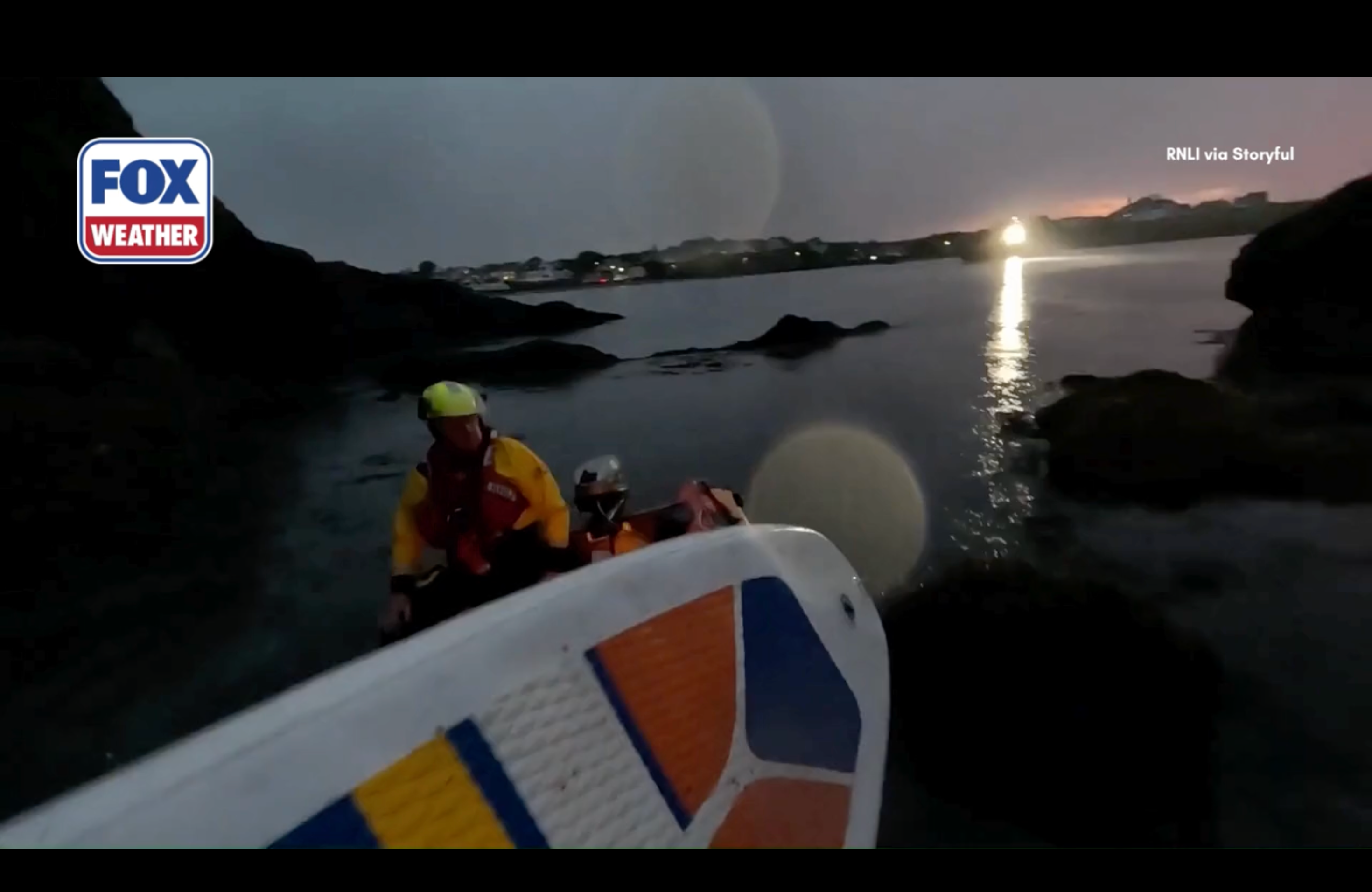 See it: Paddleboarder and dog rescued amid 'truly biblical' weather conditions