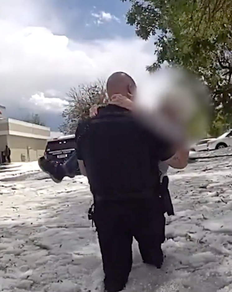 Watch: Colorado police officer rescues driver trapped in thigh-high, hail-covered floodwaters