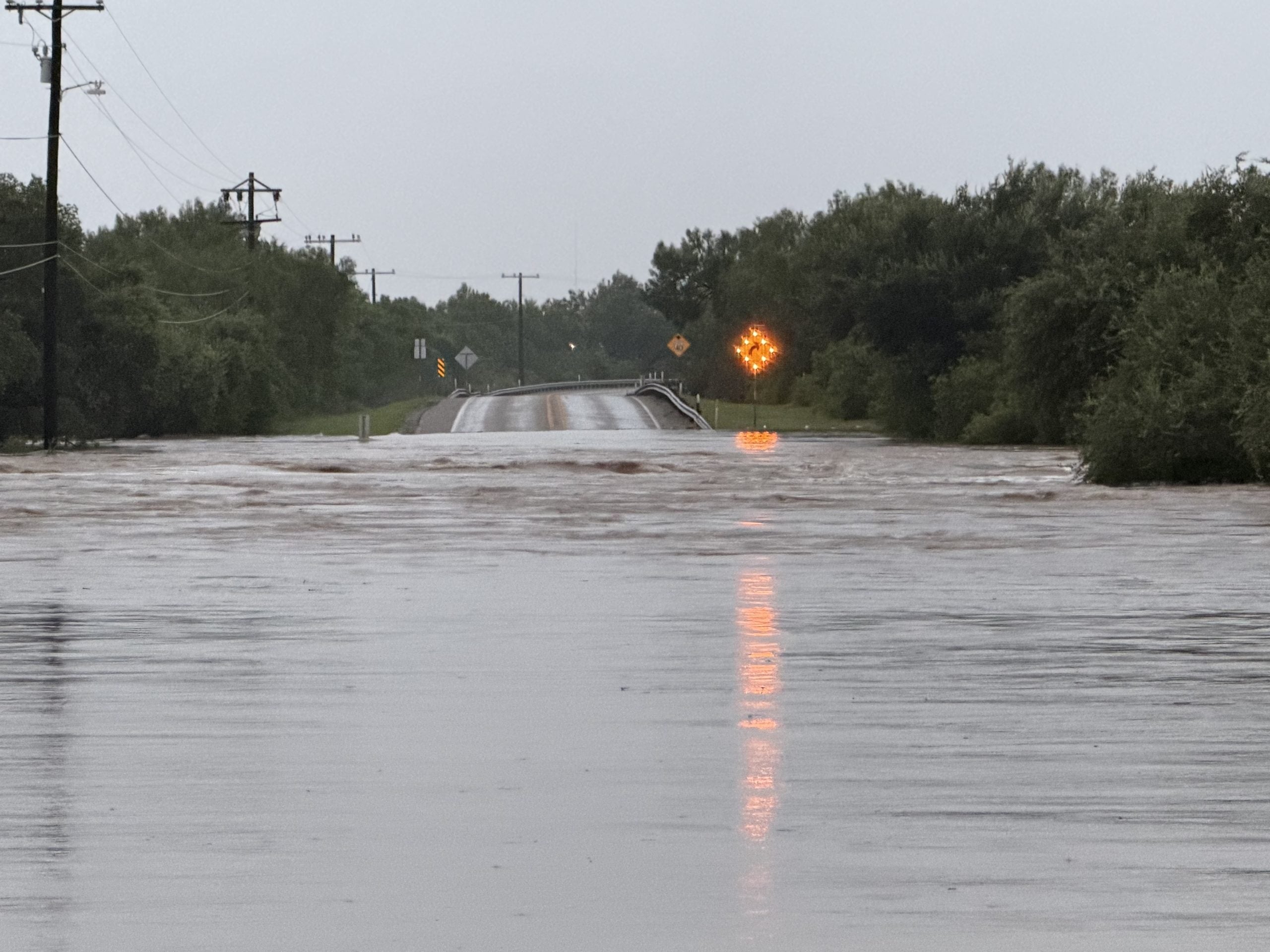 Two deadly flood waves race down Texas Hill Country rivers as catastrophic flooding paralyzes communities