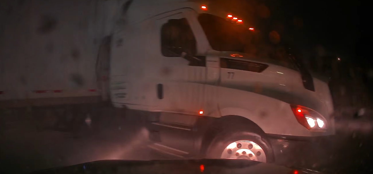 Watch: Nebraska driver narrowly avoids jackknifing semi-truck as pouring rain fuels flood threat in the Plains